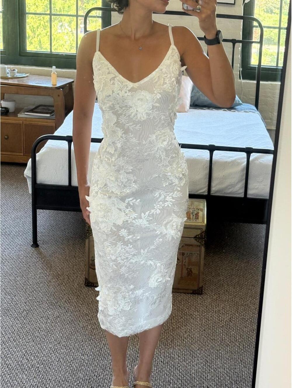 white midi-length dress from AKIRA